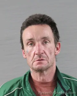 Mugshot of JOHN TRAVIS REEDER