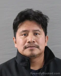 Mugshot of MANUEL REYES-HERNANDEZ