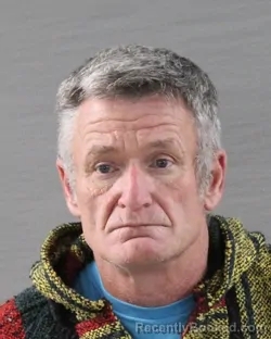 Mugshot of JUSTIN WADE MCGUIRE