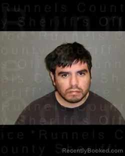 Mugshot of JONATHAN MICHAEL REYES
