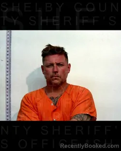 Mugshot of JUSTIN SMITH