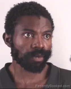 Mugshot of FRANK DJOUMESSIZAMKE