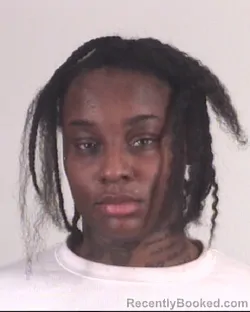 Mugshot of AISHUA MOORE