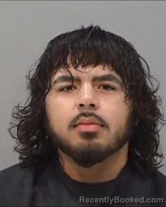 Mugshot of MAXIMUS BURCIAGA