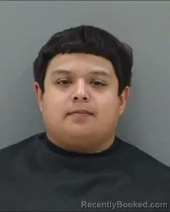 Mugshot of JUSTIN RAMON