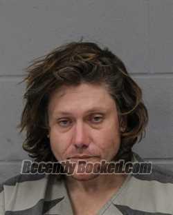Booking photo from Travis County, Texas