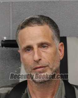 Booking photo from Travis County, Texas