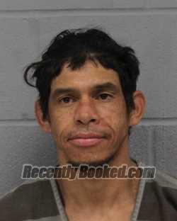 Booking photo from Travis County, Texas