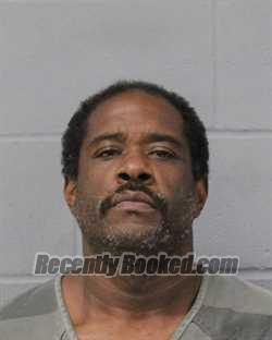 Booking photo from Travis County, Texas