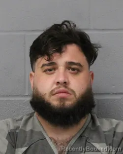 Booking photo from Travis County, Texas