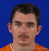 Mugshot of JUSTIN TREY LONGBRAKE