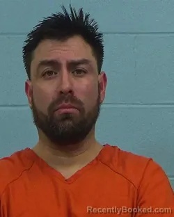 Mugshot of Alan Couoh