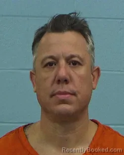 Mugshot of Wilmer Carl Frost