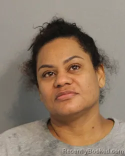 Mugshot of JENNY MARIA DELOSSANTOS-PAULINO