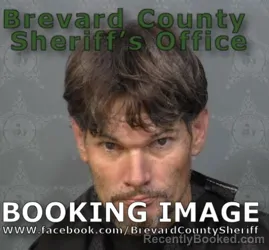 Mugshot of JOSHUA HOLLIS SCHNEIDER