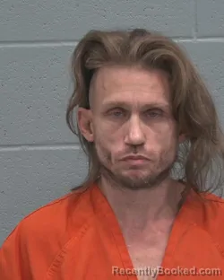 Mugshot of THOMAS JOHN THOMPSON