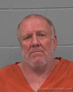 Mugshot of JOHN EMERSON WILKEN