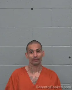Mugshot of JUSTIN MICHAEL CAMACHO