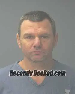 Booking photo from Santa Rosa County, Florida