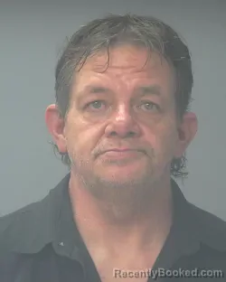 Booking photo from Santa Rosa County, Florida