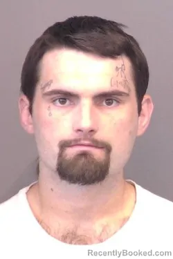 Mugshot of Tyler Howard Barton