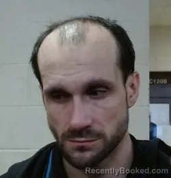 Mugshot of TRAVIS ALAN BRADFIELD