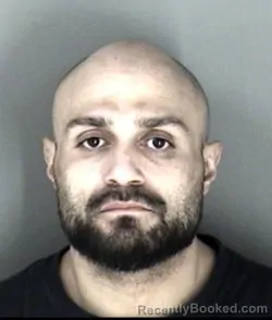 Mugshot of Miguel Angel Murga