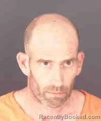 Mugshot of JON CHRISTOPHER HIGGINS