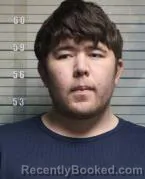 Mugshot of SADRIDDIN HOLBEKOV