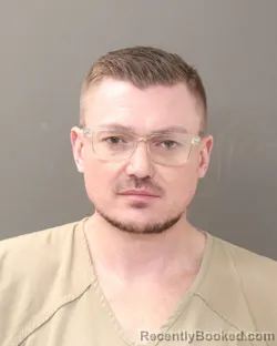 Mugshot of RYAN A MOORE