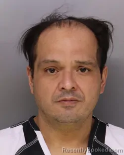 Mugshot of MARCUS FLORES