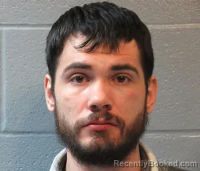 Mugshot of TREVOR R CASTO