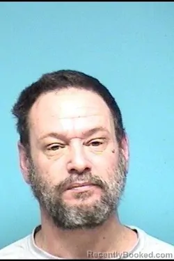 Mugshot of MATTHEW L MOORE