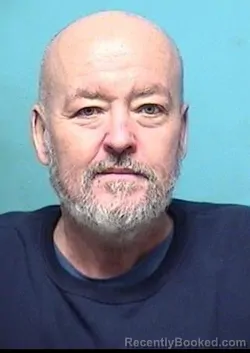 Mugshot of JOHNNY E JR Junior SMITH