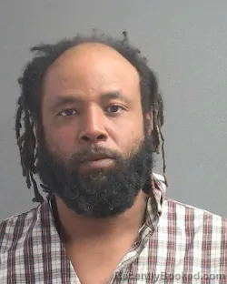 Mugshot of ERNEST NOEL DOUGLAS