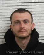 Mugshot of DUSTIN ALLEN HARTMAN