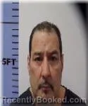 Mugshot of Hipolito Flores