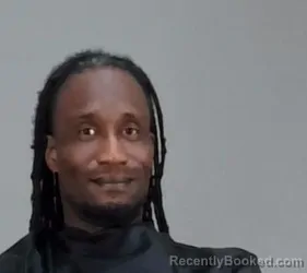 Mugshot of TERMAINE L WOODARD