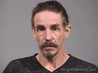 Mugshot of JOHN WILLIAM MOORE