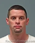Mugshot of JUSTIN LEE RHOADES