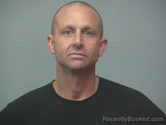 Mugshot of MYLES TUTTLE