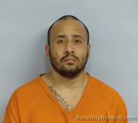 Mugshot of MILTON DAVID REYES Junior