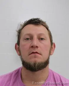 Mugshot of BRANDON REVAK