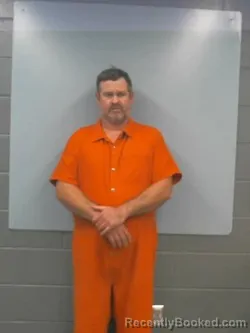 Mugshot of MATTHEW DOUGLAS FAULK