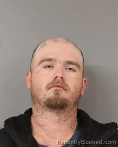 Mugshot of TREVOR LEACH