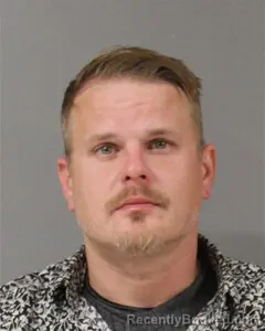 Mugshot of ADAM CARMACK