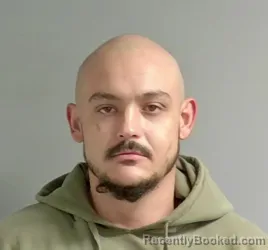 Booking photo from Calhoun County, Alabama