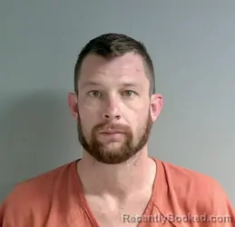 Booking photo from Calhoun County, Alabama