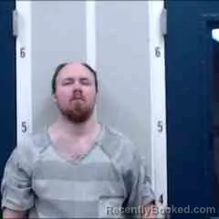 Mugshot of JONATHAN JOHNSON