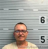 Mugshot of MICHAEL HUGHES